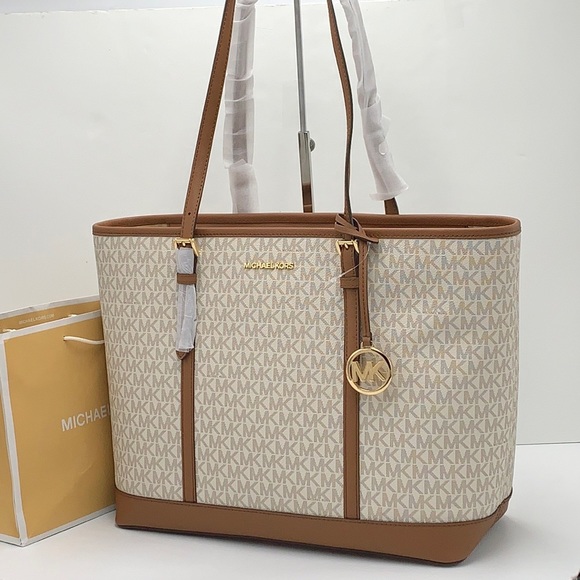 MICHAEL KORS
Jet Set Travel Large Logo Tote Shoulder Bag
COLOR VANILLA 
NWT - Picture 15 of 16